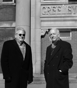 Photo by Clare Howard Sandy Farkash, left, and John Meisinger, former principals in Peoria public schools, stand in front of the shuttered Greeley School on NE Jefferson Avenue. The two retired principals are meeting with business, political and community leaders to coordinate efforts to remove incumbents from the School Board. They are urging people to vote on April 7, but they are not endorsing a candidate.  