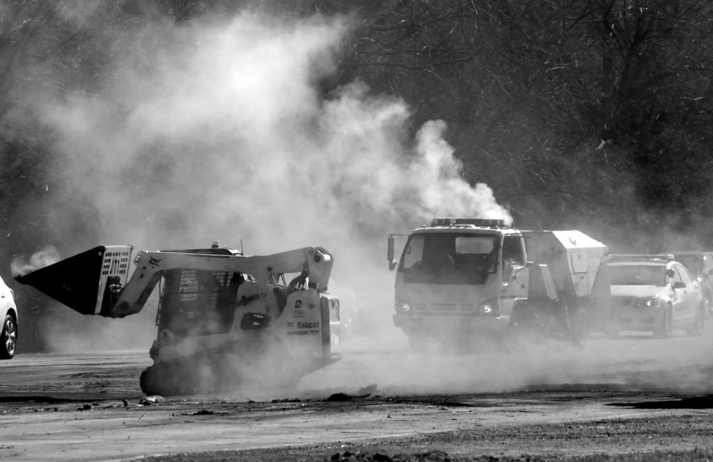 Coal ash dust blankets the cleanup site like a dense fog following a crash on Illinois Route 29. Although the EPA has decided coal ash should not be classified as a hazardous waste, it does contain toxins and cleanup regulations call for protection from exposure. Photo by Clare Howard
