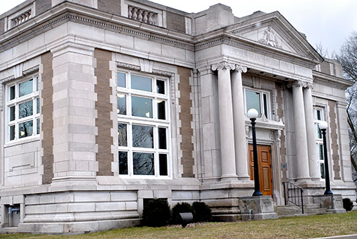 The Lincoln Library, a branch of the Peoria Public Library, opened in 1911, and was placed on the National Registry of Historic Places by the National Park Service in 2014. Andrew Carnegie helped fund the original library built in the Neoclassical Revival style with ionic columns, strong quoins and a prominent front pediment.