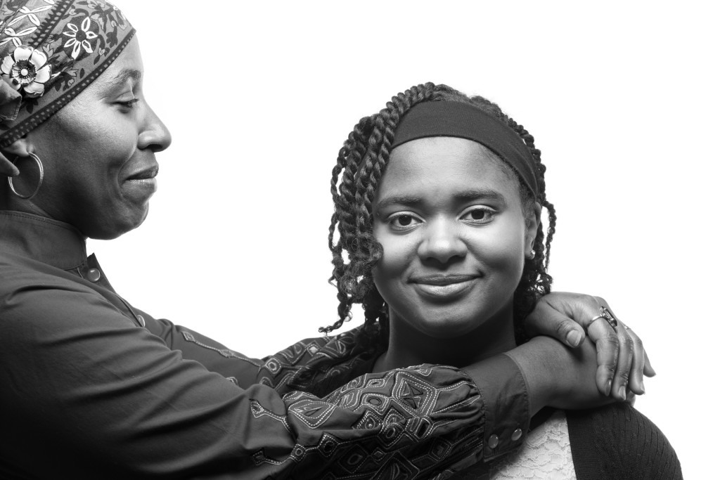 Photo reprinted with permission This image of a mother and daughter is one of 50 portraits taken by photographer Keith Cotton as part of his series on people living in Peoria’s East Bluff. Cotton’s photos capture warmth and emotion, imbuing life and personality into an older neighborhood that is often driven through or driven around.