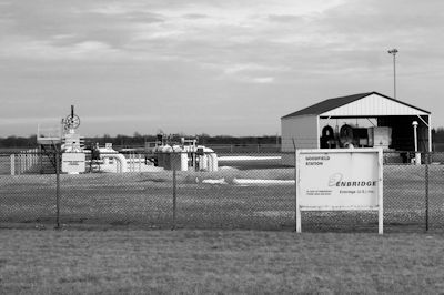 Photo by Clare Howard The Goodfield Station is one of seven above-ground pump stations on the 600-mile Enbridge Flanagan South Pipeline that connects Canadian crude oil from tar sands in Alberta with the Gulf Coast. The pipeline became operational in November, and at peak capacity it will transport more crude oil than the controversial Keystone XL. Enbridge used Russian-based steel producer EVRAZ for all pipe for the $2.8 billion Flanagan line. Nearly 3,000 people were employed for almost one year during construction of the line but few new permanent positions were created.