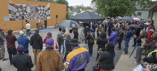 The Western Avenue Mural Project: Wall #1 by R. Rashad Reed, assisted Brenda Gentry. The central theme of the mural is the concrete rose, which highlights the ability to succeed even in an adverse environment. Orlando Randle of TTs Bar B Q had the idea of a mural celebrating the people of the Southside. Mr. Randle contacted Councilwoman Denise Moore who took action to arrange for sponsorship by the City of Peoria, Greater Peoria LISC, and The Heritage Ensemble. The mural is located at 436 South Western Ave.