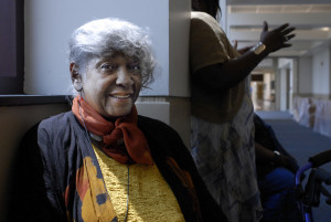 Mae Winston, 77, sits outside the courtroom waiting for July 28 hearing to review murder conviction of her brother Cleve Heidelberg. She was in court again for his hearing Sept. 22, but her health is declining. 